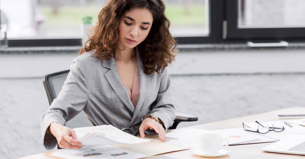 16 Best Legal Pages for Websites: Blog & Business Must-Haves - stack of legal papers and documents on table