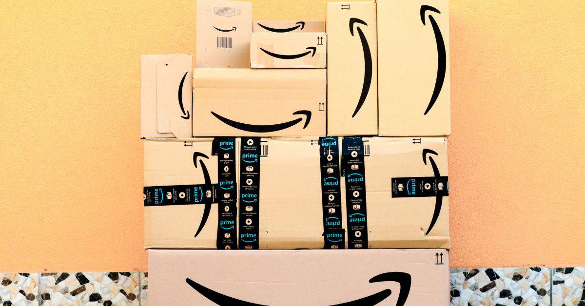 How to get almost anything for Free from Amazon - stack of Amazon boxes up against a wall